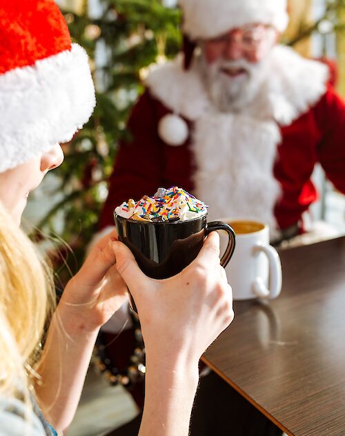 festive fun, including decorating a gingerbread cookie, creating a wooden ornament or photo frame and Christmas colouring