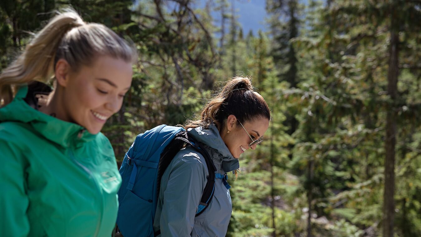 Two girls walking on a trail