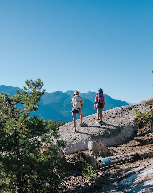 Two people looking out at a view