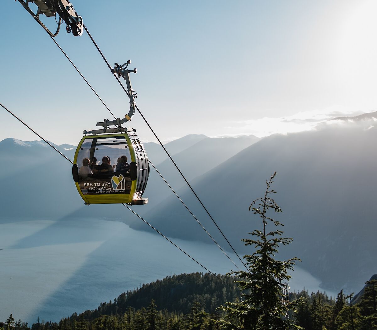 A gondola cabin in front of the ocean view