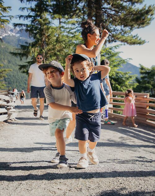 two young boys on a trail