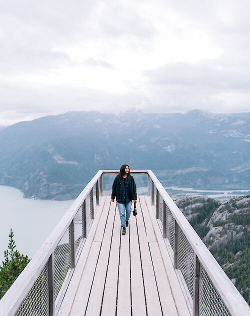 a women standing on the chief outlook platform