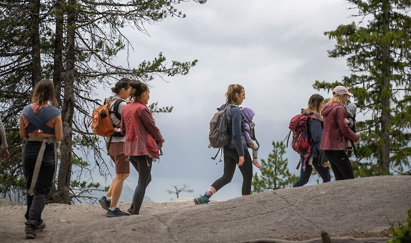 a group of moms walking