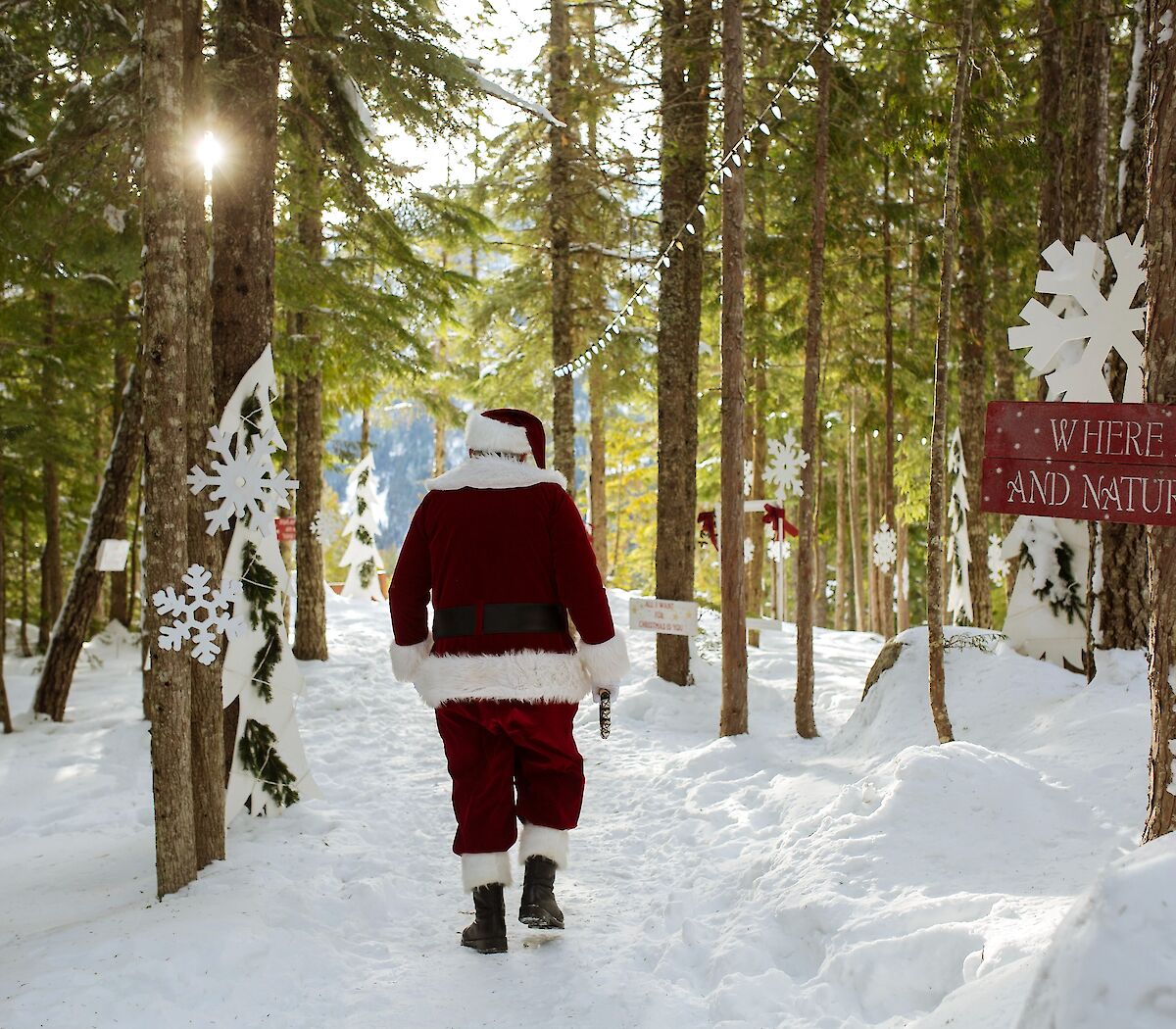 Santa walking on the decorated Spirit Trail